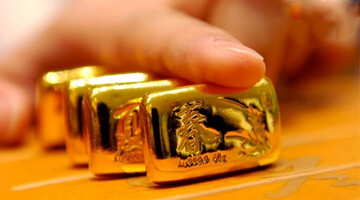 با کاهش تنش در اوکراین، قیمت جهانی طلا پایین آمد