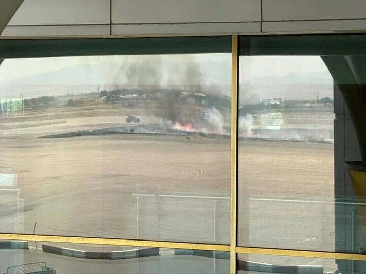 آتش‌سوزی کنترل‌شده در فرودگاه مشهد تا ساعاتی دیگر